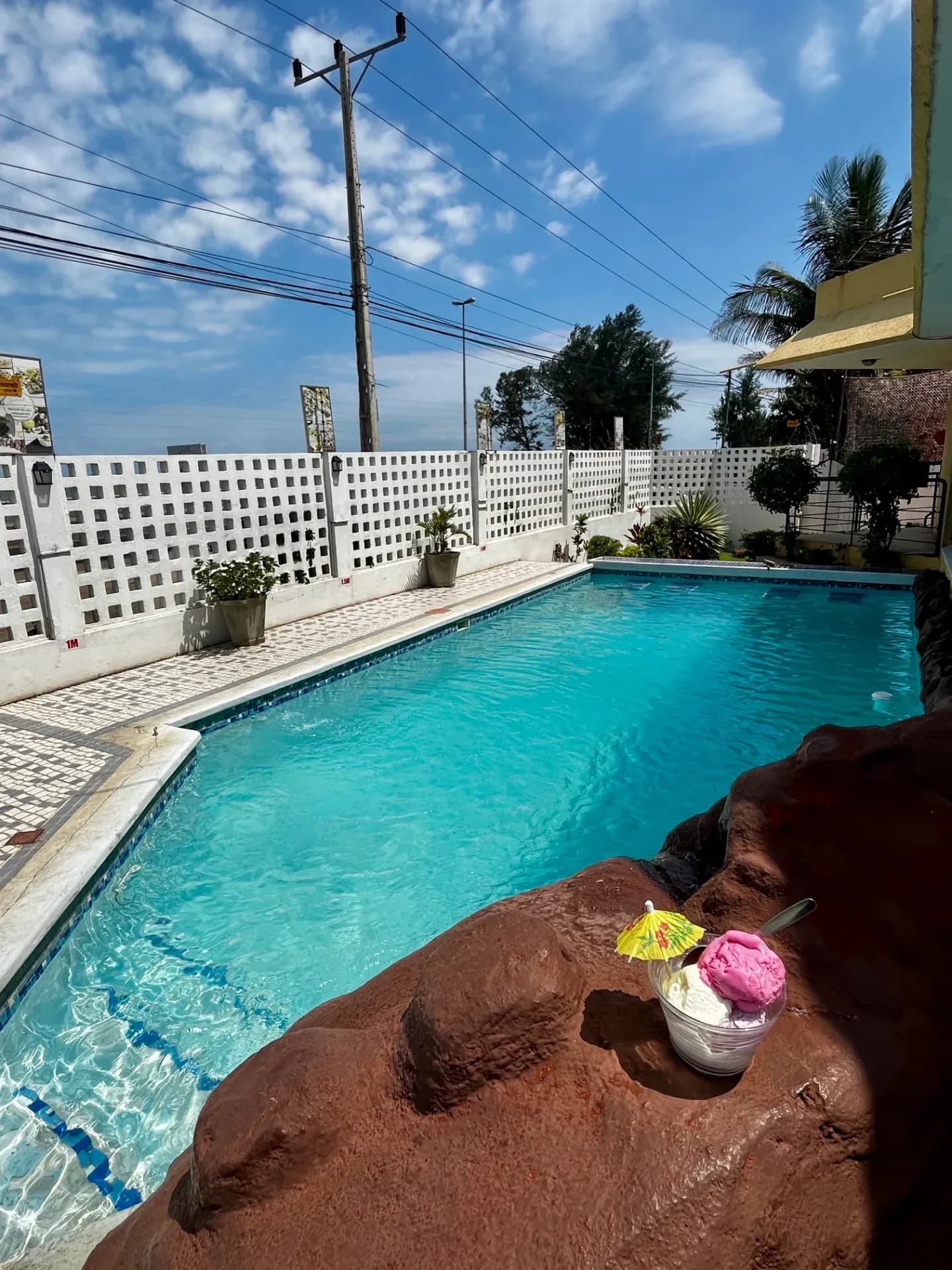 Pastello pool area with poolside treats